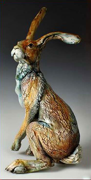 a statue of a rabbit sitting on its hind legs