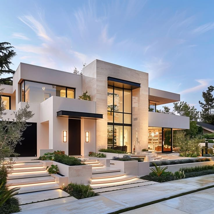 a modern house with steps leading up to it