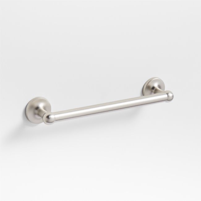 a stainless steel towel bar on a white background