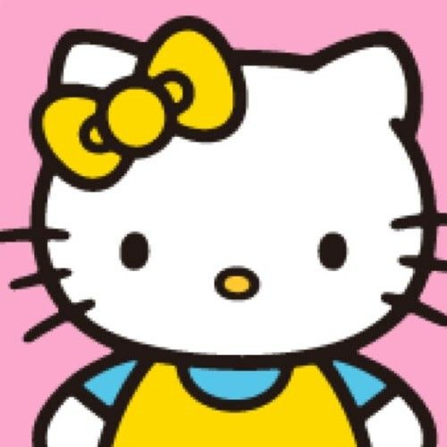 an image of a hello kitty with a bow on it's head and yellow dress