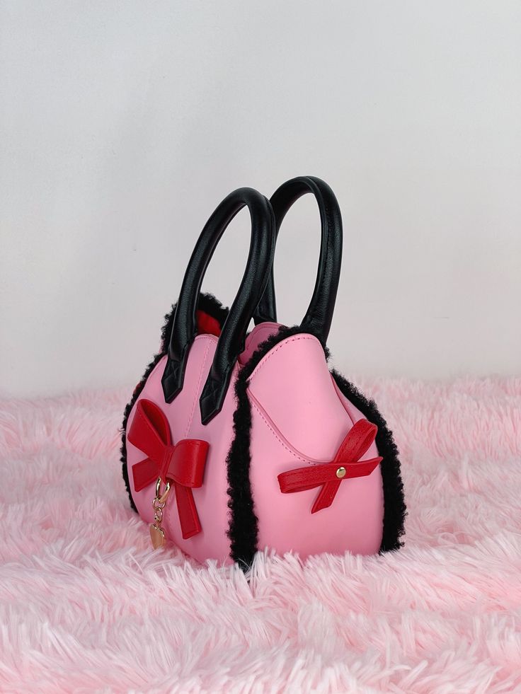 This item is in-stock and ready to ship. The processing time is 1-5 business days. Inspired by Mew Ichigo, this cosmetic bag is both cute and glamorous. As with all of the bags, this bag is created with PU and features adorable cat-shaped “ears” and bowknots. Black faux sherpa wool adds a dash of fluff and softness to the overall look. Dump your favourite cosmetics in this bag, then grab and go! ♡ BAG DETAILS + FEATURES ♡ Material: PU (vegan/faux leather) ♡ Measurements (LxWxH): 20x10x10 cm ♡ Go Cute Everyday Bag With Bow, Cute Everyday Bags With Bow, Cute Everyday Bags With Bow Detail, Pink Bow Bag For Daily Use, Pink Shoulder Bag With Bow For Everyday Use, Cute Pink Bag With Bow, Cute Bag With Bow For Gift, Pink Tote Cosmetic Bag As A Gift, Pink Tote Cosmetic Bag Perfect For Gifts