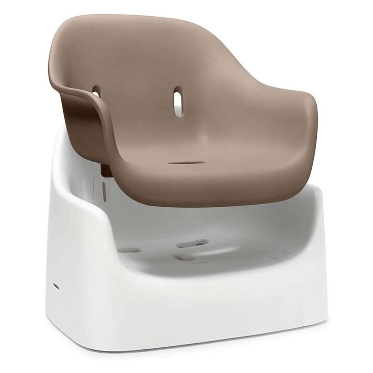 a brown and white plastic chair sitting on top of a white base with no legs