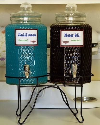 two ice cream dispensers sitting next to each other