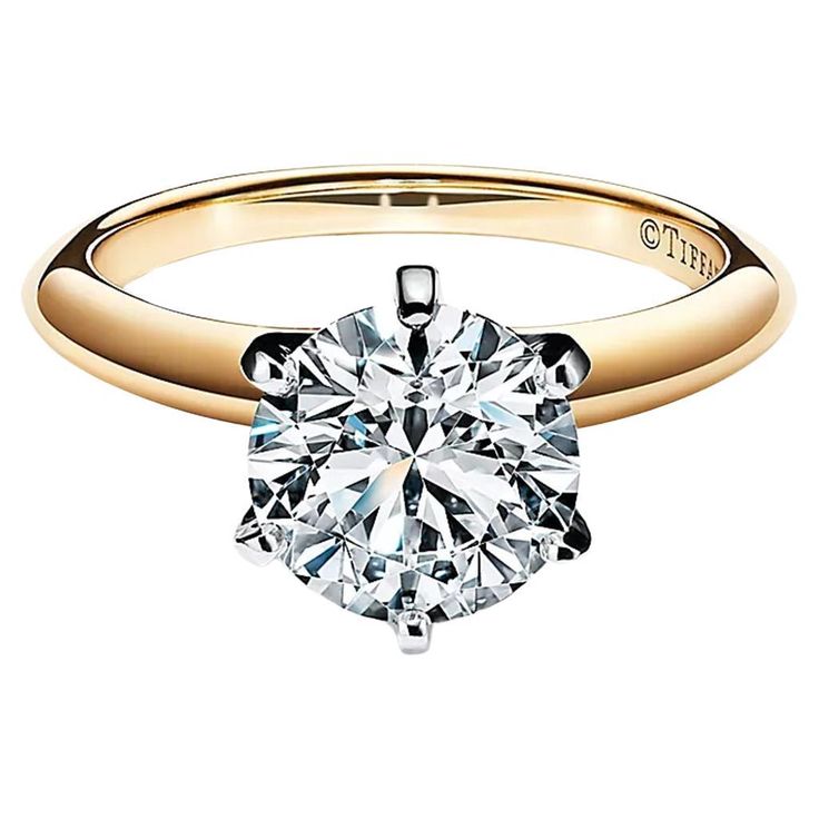 Tiffany & Co. 1.83 ct Total Weight 18k Rose Gold & Platinum Round Brilliant Cut Diamond Solitaire Engagement Ring. The ring weighs 4 grams, size 5, the center stone is a 1.83 ct Natural Round Brilliant Cut diamond, G in color, VVS2 in clarity, Triple Excellent Cut, Polish, Symmetry This is a rare & highly in demand Canadian mined diamond from Tiffany! Tiffany Gold Engagement Ring, Tiffany Diamond Ring, Tiffany Engagement Ring, Pretty Engagement Rings, Brilliant Cut Diamond Ring, Tiffany Diamond, Platinum Engagement Rings, Modern Ring, Wide Band Rings