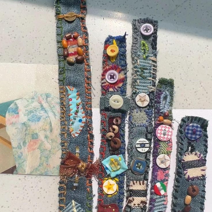 several pieces of fabric with buttons on them