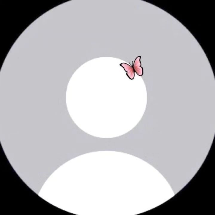 the butterfly is flying in front of the white circle on the black and gray background