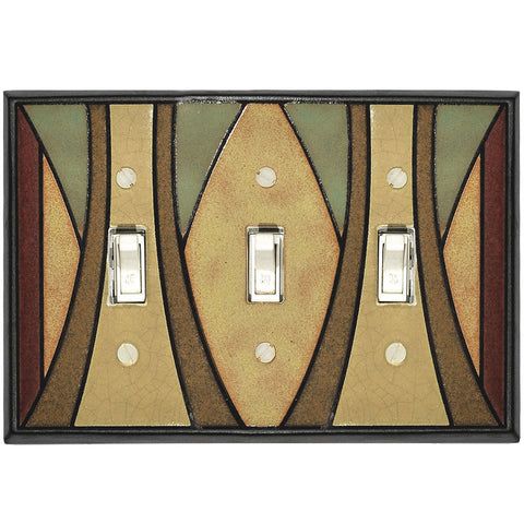 two light switch covers with abstract designs on them