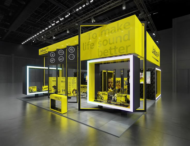 an exhibit booth with yellow and black colors on the walls, displays information about what it's like to be around