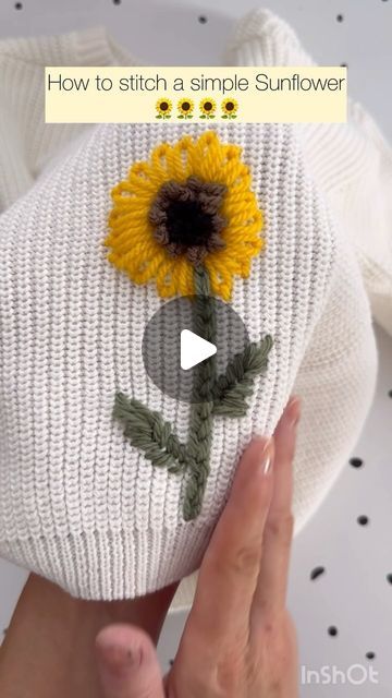 someone is stitching a sunflower on a white knitted beanie with the words, how to stitch a simple sunflower