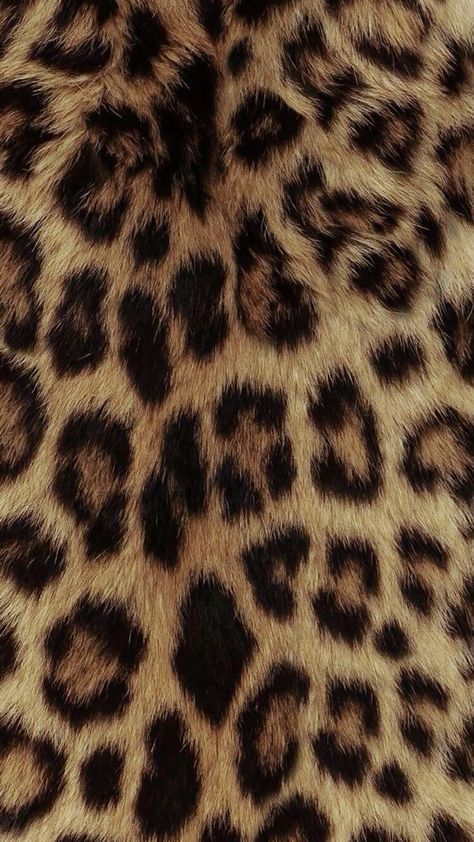 an animal print pattern is shown in brown and black colors on a fur textured surface