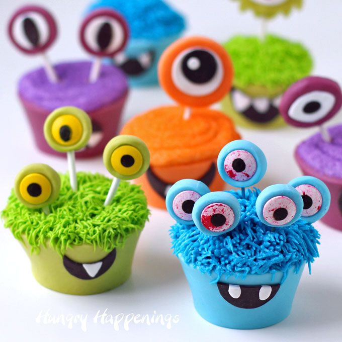 some cupcakes with googly eyes on them