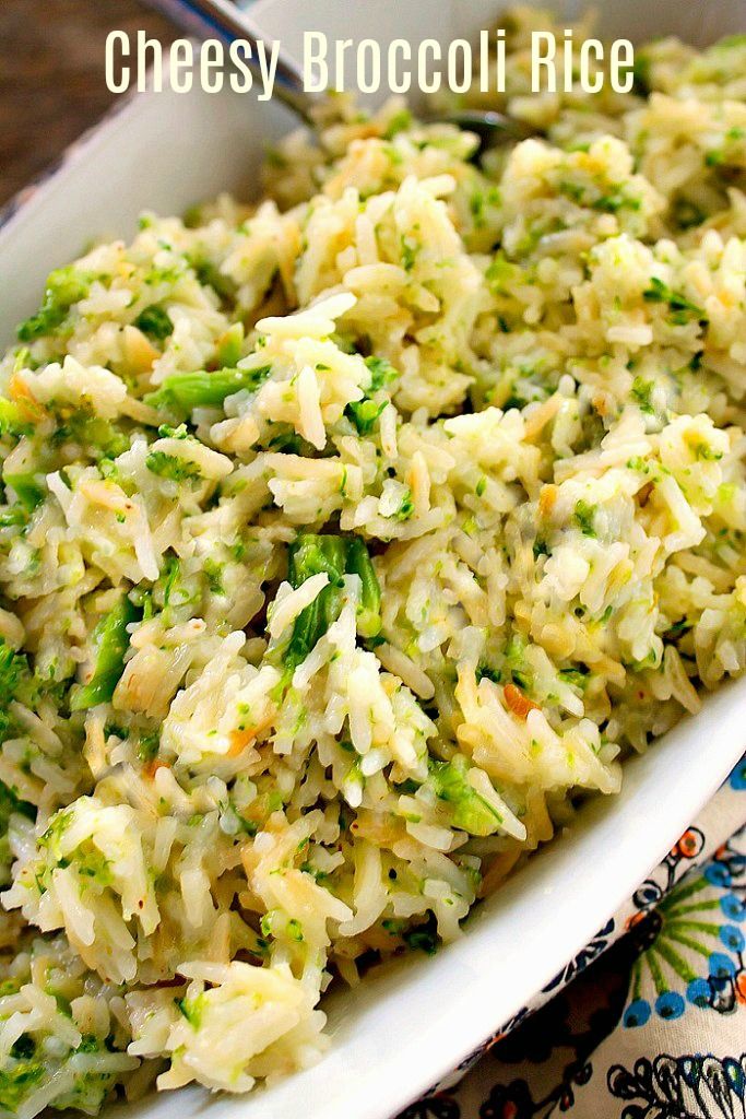 a bowl filled with rice and broccoli on top of a floral table cloth