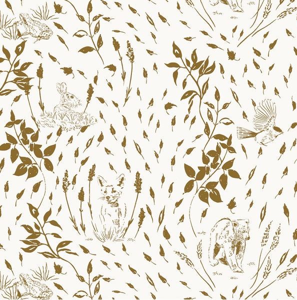 an animal and plants pattern is shown in gold on a white background with brown leaves