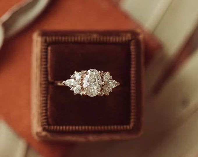 an engagement ring in a velvet box