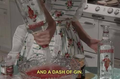 a woman is pouring something into a glass bowl with the words and a dash of gin on it