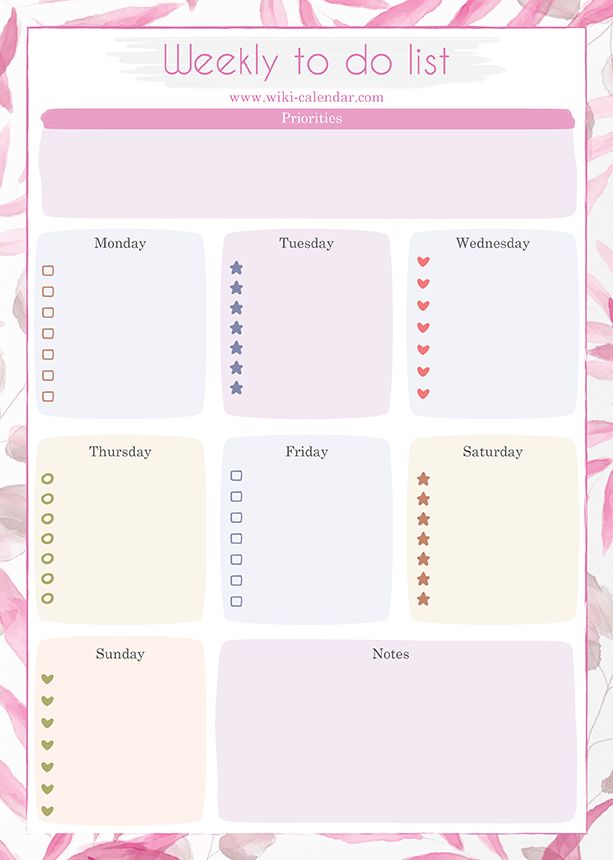 the weekly planner with pink flowers on it