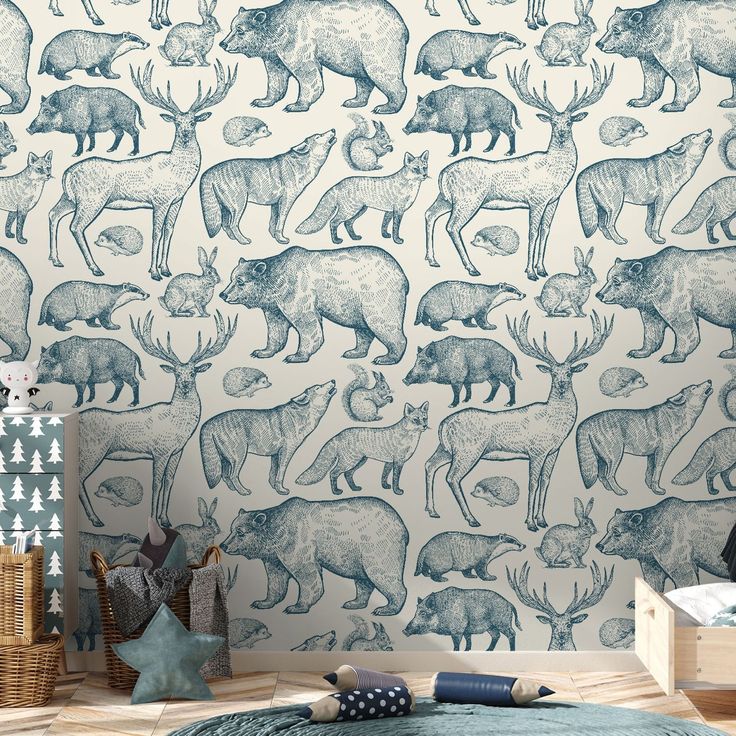 a room with a wallpaper that has animals on it