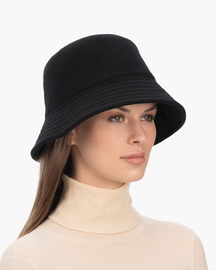 A cozy, lightweight women's bucket hat of spun wool with trapunto stitched brim rolls up easily into a coat pocket or a tote bag. Eric says, "It's definitely a bucket hat season where the attitude is a bit more casual than a fedora." What makes this women's bucket hat most desirable is that the crown is spun and then blocked to achieve the shape; The crown has no visible seams so it doesn't feel thick, while providing great insulation and protection from the elements. Brim span: 2.75"(7cm) Fully Gold Sand, Coat Pocket, Navy Linen, Natural Gold, Hats For Sale, Fedora Hat, Black Cream, Cream White, The Crown