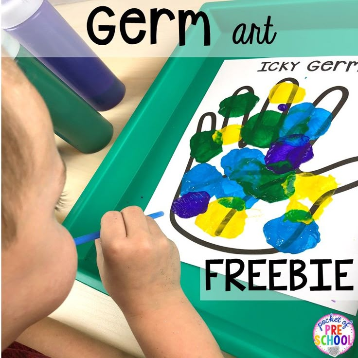 a young child is working on an art project with the title germ art freebie