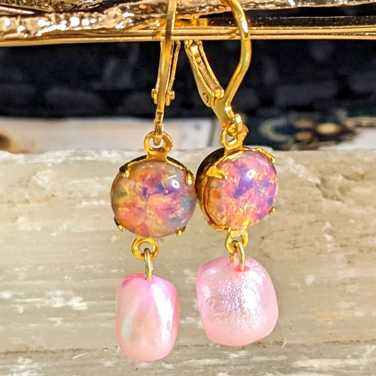 Here Is A Dangle/Drop Down Earrings Made With Czech Glass Pink Fire Opal Measurement: 8mm It Is Combined With: A Cultured Freshwater Pearl Dyed Pink. The Pearl Is Wonderfully Dyed And Present A Natural Look. For More Pink Fire Opal Pieces, Please Search Under This Title. The Base Material Is 18k Gold Plated. Please See My Other Listings For Baroque Pearls Combined With Crystals Or Gems, That Are Unique In Design. Pink Teardrop Pearl Earrings For Formal Occasions, Pink Dainty Earrings For Formal Occasions, Dainty Pink Earrings For Formal Occasions, Pink Drop Pearl Earrings For Formal Occasions, Pink Earrings For Celebration, Formal Pink Handmade Earrings, Dainty Pink Earrings For Party, Handmade Pink Earrings For Formal Occasions, Elegant Gold Jewelry With Pink Opal