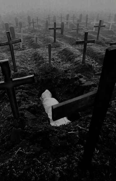 three wooden crosses in the ground with a quote from roman catholics above them that says, for we brought nothing into the world and we can take nothing out of it