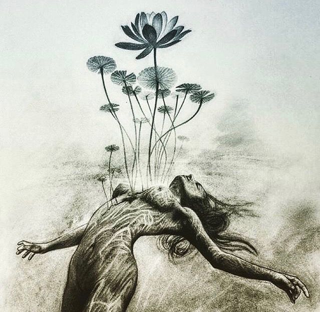 a drawing of a woman laying on the ground with flowers growing out of her head