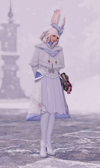 a woman is walking in the snow wearing a white outfit