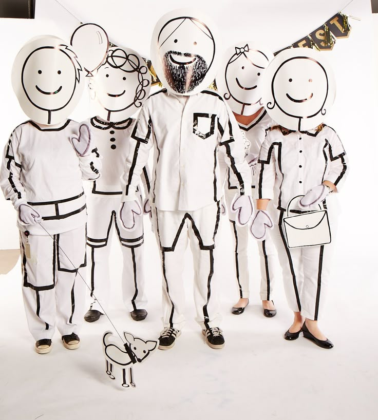 a group of people standing next to each other in front of a white background with black lines