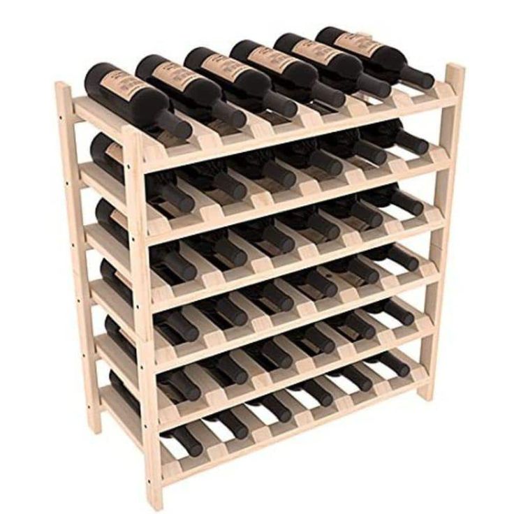 a wooden wine rack filled with lots of bottles