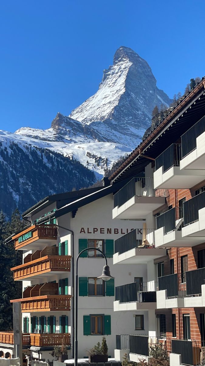 A view of the Matterhorn from Zermatt, Switzerland Switzerland Zermatt, Zermatt Matterhorn, The Matterhorn Switzerland, Switzerland Town, Switzerland Aesthetic Vintage, Zermatt Switzerland Summer, Swiss Chalet Interior, Ski Europe, Switzerland Christmas