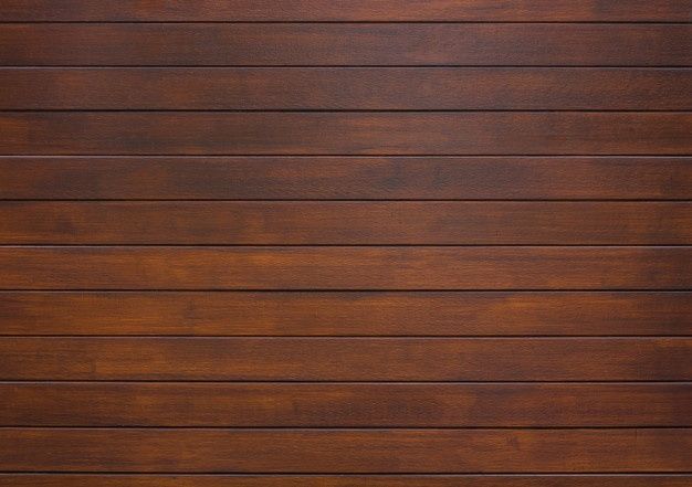 a close up view of a wooden door with horizontal slats on the bottom and sides