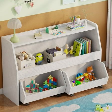 a white book shelf filled with lots of toys