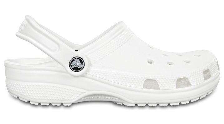 Slip into your favorite clog and enjoy a custom fit, water-friendly design and ventilated forefoot for breathability.  Crocs trade  Classic Details:    Ventilation ports add breathability and help water and debris drain away.  Water-friendly and buoyant  weighs only ounces.  Fully molded Croslite trade  material for signature Crocs comfort.  Heel strap offers a secure fit.  Odor-resistant, easy to clean, and quick to dry.  Lightweight, non-marking soles.  Fit style: Roomy � generous in length an Crocs Shoes For Men, Flat Sandals Wedding, White Crocs, Beach Wedding Sandals Barefoot, Blue Wedding Shoes, Pretty Shoes Sneakers, Satin Shoes, Crocs Classic Clogs, Ankle Strap Flats