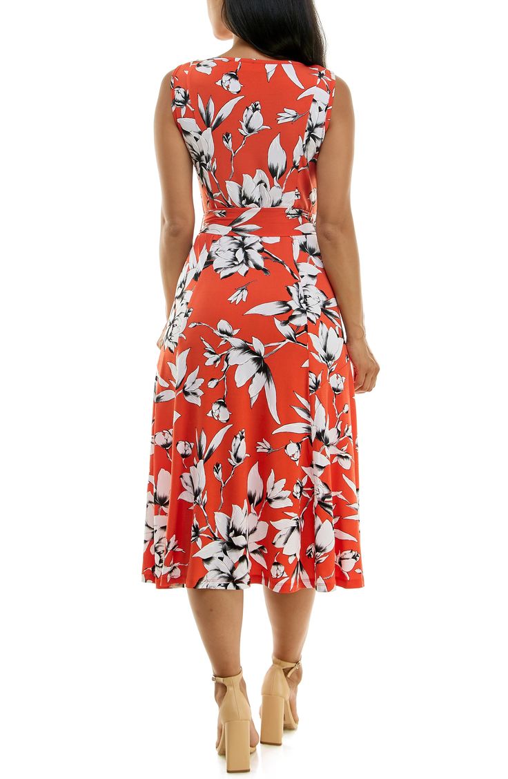 A vibrant printed midi dress is perfect for summer events. Fit: this style fits true to size. 50" length (size Medium) Crewneck Sleeveless Attached waist tie 95% polyester, 5% spandex Machine wash cold Imported Model stats: 5'10", 32" bust, 25" waist, 36" hip. Model is wearing size Medium. Printed Knee-length Midi Dress For Summer, Printed Knee-length Maxi Dress For Summer, Printed Summer Maxi Dress, Summer A-line Printed Midi Dress, Printed Knee-length Summer Midi Dress, Spring Sleeveless Printed Midi Dress, Sleeveless Printed Midi Dress For Spring, Printed Sleeveless Midi Dress For Spring, Summer Knee-length Printed Midi Dress