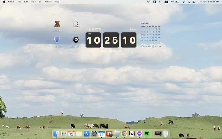 a computer screen with the time displayed on it's side and cows grazing in the background