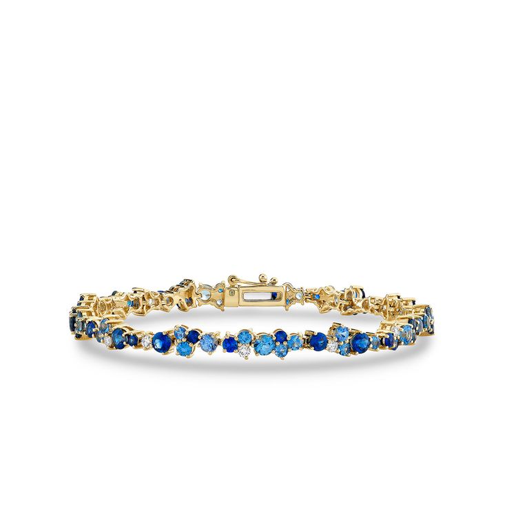 Discover timeless elegance with Sydney Evan's exquisite fine jewelry collection. This stunning tennis bracelet is crafted with meticulous attention to detail from 14k yellow gold, adorned with captivating blue sapphires and dazzling diamonds. The bracelet measures 6.75" in length, perfectly accentuating your wrist with a touch of sophistication. Elevate any ensemble with this exquisite piece that effortlessly combines classic style and modern allure. Explore Sydney Evan's fine jewelry ... Blue And Yellow Jewelry, Blue Tennis Bracelet, Something Blue Bracelet, Blue And Gold Bracelets, Blue Jubilee Gold Bracelet In Fine Jewelry Style, Yellow Gold Sapphire Jubilee Bracelets, Yellow Gold Sapphire Diamond Bracelet In Fine Jewelry Style, Yellow Gold Sapphire Diamond Bracelet, Gold Sapphire Tennis Bracelet