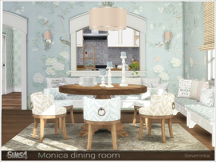 a dining room with blue walls and floral wallpaper on the walls is decorated in pastel tones