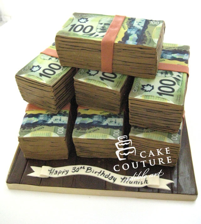 a cake made to look like stacks of money