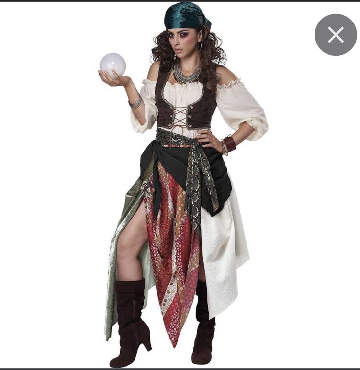 a woman dressed as a pirate holding a ball