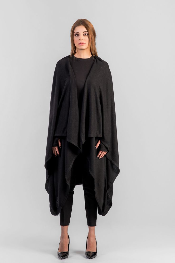 Women's draped cardigan jacket with belt closure. Color: Black Material: Angora Blend (Wool, Viscose) -------------- SIZE GUIDE -------------- (based on body measurements) SIZE XS (US 4, UK 8, EU 34) bust: 82 cm / 32 inch waist: 62 cm / 24½ inch hips: 86 cm / 34 inch SIZE S (US 6, UK 10, EU 36) bust: 86 cm / 34 inch waist: 66 cm / 26 inch hips: 90 cm / 35½ inch SIZE M (US 8, UK 12, EU 38) bust: 90 cm / 35½ inch waist: 70 cm / 28 inch hips: 94 cm / 37 inch SIZE L (US 10, UK 14, EU 40) bust: 94 cm Black Winter Shawl Wrap, Black Shawl Wrap For Winter, Versatile Wrap Outerwear For Layering, One Size Wrap Shrug For Fall, Oversized Cape Shawl For Spring, Winter Wrap Cape One Size, Oversized Spring Cape Shawl, Oversized Cape Cardigan For Spring, One Size Winter Wrap Cape