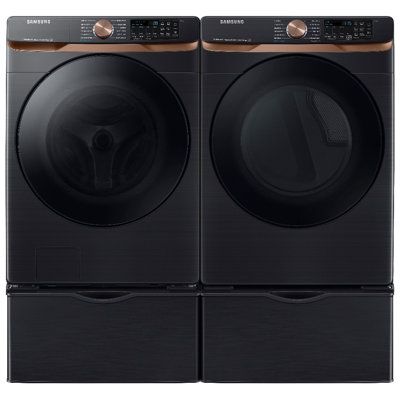 the front load washer and dryer are shown in black, with brown accents