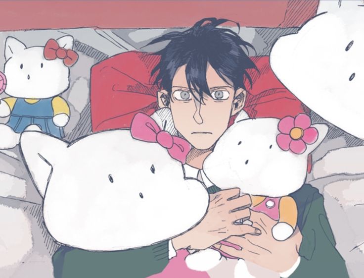 a person laying in bed with two stuffed animals on their chest and one holding a teddy bear