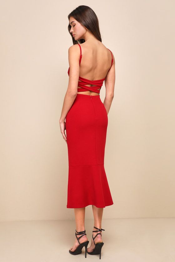 Everyone loves a look that'll make them stunning in an instant, and that's why you'll love the Lulus Divine Perfection Red Strappy Sleeveless Trumpet Midi Dress! Stretchy crepe knit shapes this sultry dress that features a sleeveless darted bodice, a straight neckline, and adjustable spaghetti straps. The fitted waist tops a figure-flaunting bodycon skirt that cascades down to a tiered, trumpet midi hem. Strappy detailing crisscrosses atop the open back for an extra eye-catching finish. Hidden b Red Wedding Guest Dresses, Sultry Dress, Chic And Elegant, Bodycon Skirt, Wedding Guest Dresses, Tiered Midi Dress, Straight Neckline, Body Con Skirt, Red Wedding