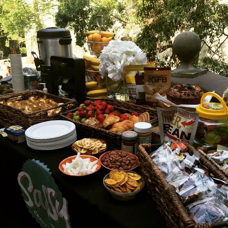 a table filled with lots of food and snacks