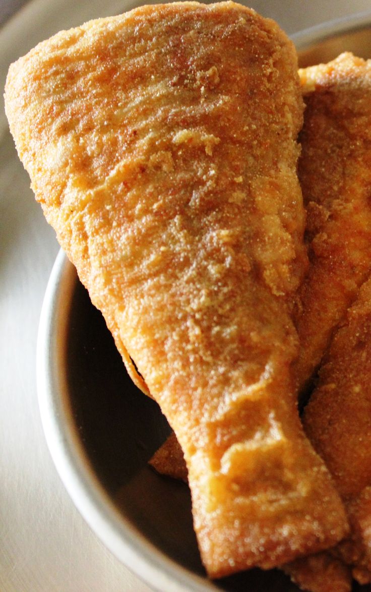 two fried food items in a bowl on a table