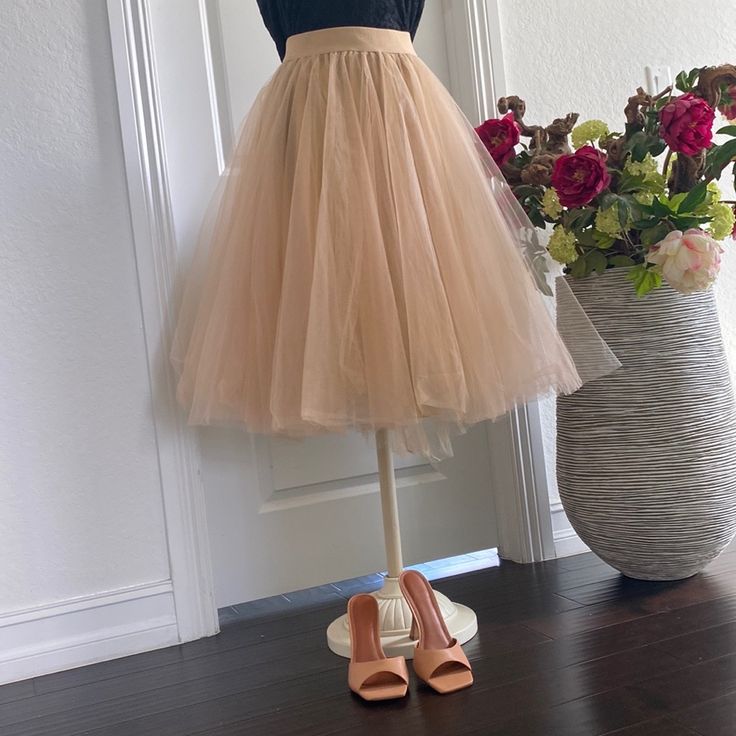 This Midi Beige Tulle Skirt Is Extra Puffy For Special Occasions. It’s Triple Layered And Has An Elastic Waistband For More Comfort. Last One Available! Size Small (Fits Sizes 2-8us) Beige Party Skirt For Spring, Spring Party Beige Skirt, Beige Tiered Skirt For Party, Cream Flared Skirt For Party, Elegant Beige Tulle Skirt Bottoms, Beige Flared Party Skirt, Party Beige Midi Skirt, Beige Flared Skirt For Party, Beige Midi Skirt For Party