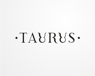 the word taurus written in black ink