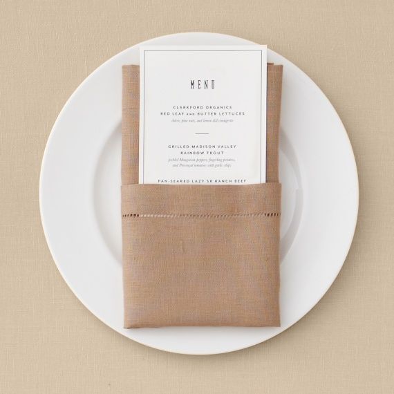 Transform your table setting with this elegant and practical pocket napkin fold. Perfect for weddings and dinner parties, these clever linens serve double-duty as placeholders. Slip in a menu, place card, single bud, or set of utensils for a sleek and stylish touch.