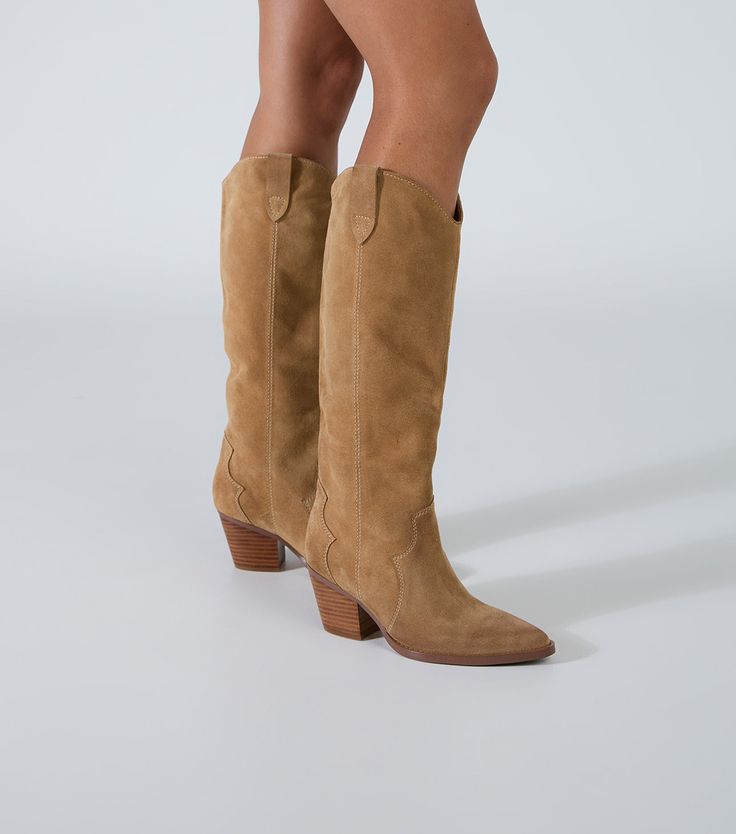 Don't overlook Presley. This western-inspired boot is set to steal the spotlight this season. Made from our signature suede leather, featuring open stitch detailing and chic 7cm block heel. Presley will be on high rotation this season. -Material: Suede -Sole: Man-made -Fit: True to size -Toe-shape: Almond -Features: Block heel -Heel: 7cm Leg Height x Calf Circumference x Opening Circumference 5 - 347mm x 348mm x 358mm 5.5 - 351.5mm x 353.5mm x 363.5mm 6 - 356mm x 359mm x 369mm 6.5 - 360.5mm x 36 Thigh High Boots Flat, Steal The Spotlight, Embellished Heels, Metallic Shoes, Tony Bianco, Bow Heels, Slingback Shoes, How To Stretch Boots, Mesh Shoes