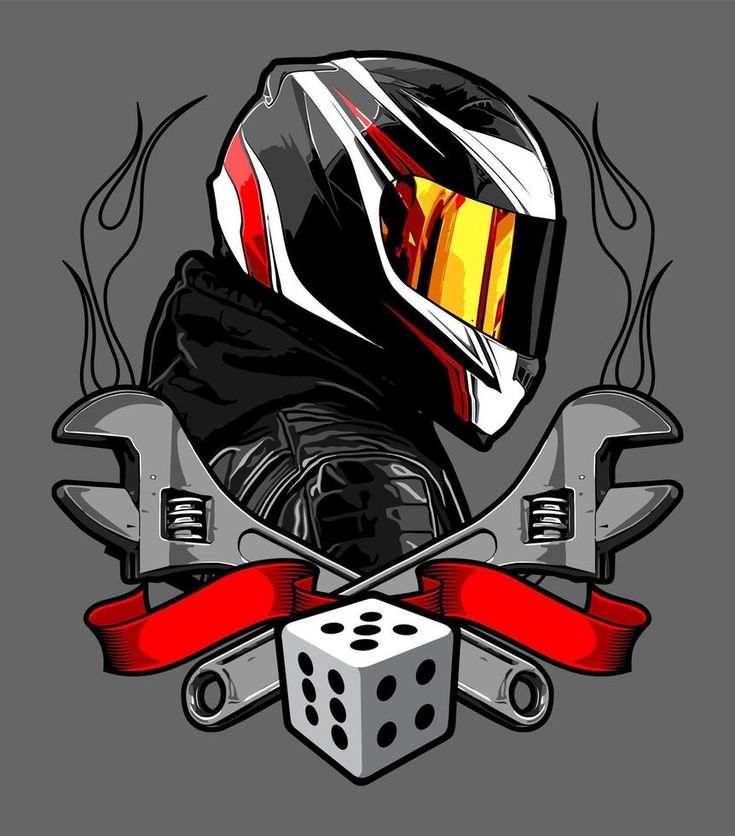 a motorcycle helmet and two wrenches on top of a dice